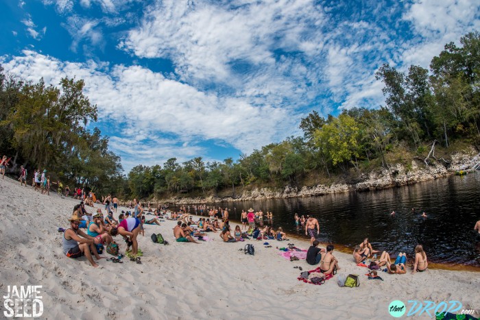 Relaxing by the river during the day. Photo by Jamie Seed Photography