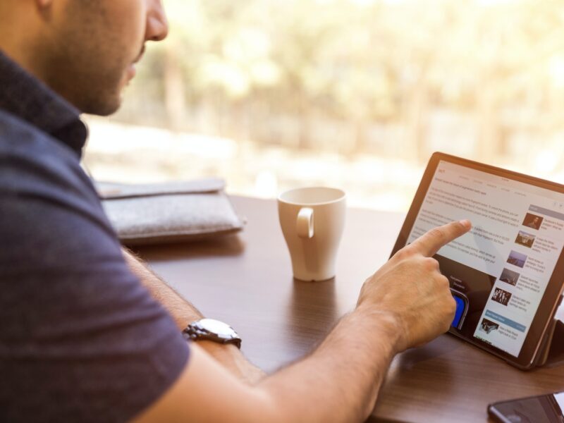 man holding tablet computer