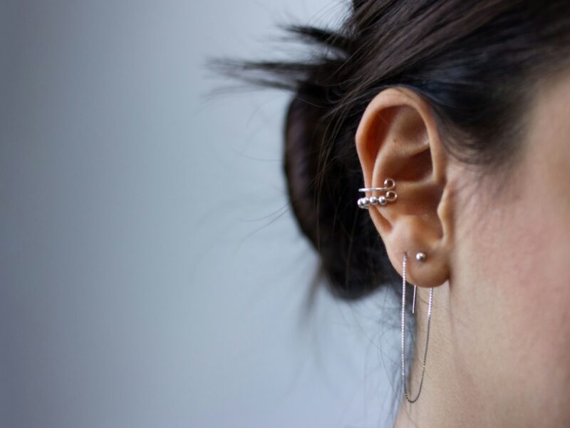 silver-colored earrings