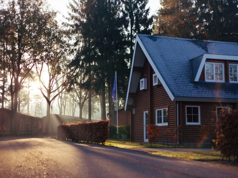 brown and red house near trees