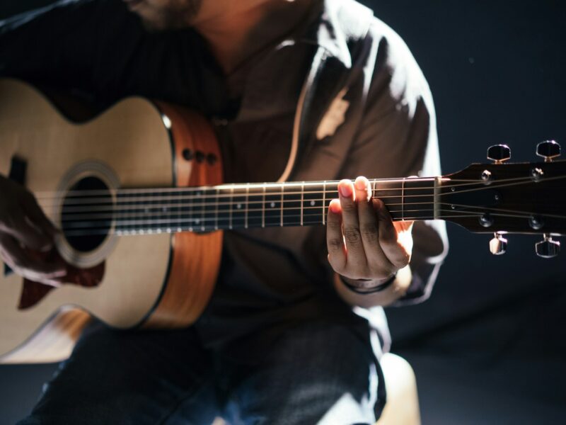 person playing guitar