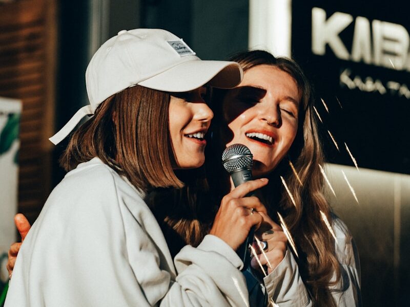 a couple of women standing next to each other