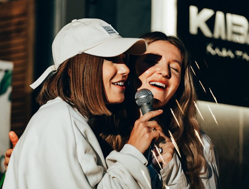a couple of women standing next to each other