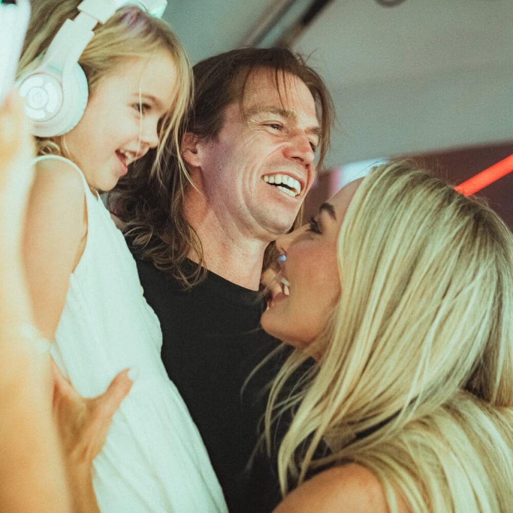 Brooke Evers with daughter and husband Matt Stafford